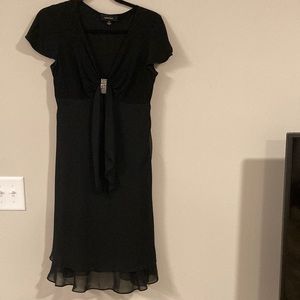 Used but in excellent condition size 8 black dress!